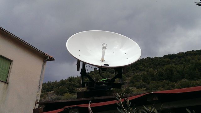 Satellite antenna with an open dish on a metal mount